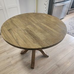 Solid wood drop-leaf dining table