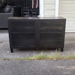 Black wood entertainment center /TV stand with glass doors