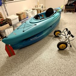 Two 10’ Sit inside kayaks With Oars