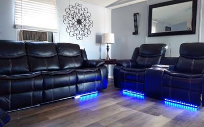 Brand new 3 pcs power motion Leather Recliners with LED Under-Lighting.