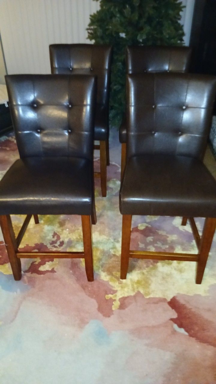 *$50* 4 Brown Leather Chairs