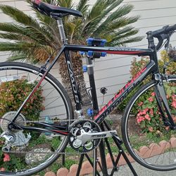 Cannondale roadbike size 56cm large shimano tiagra 18 speeds like new..