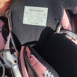 2 pairs of pink panda roller blades size 3