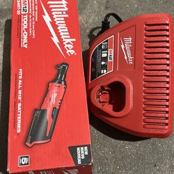 Milwaukee  3/8 ratchet  and  charger  no battery