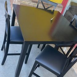 Black table with 4 chairs brand new **