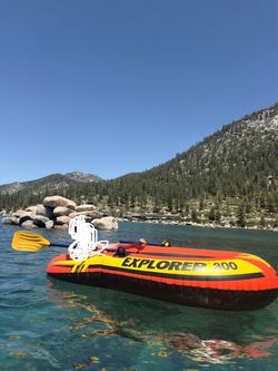 2 Inflatable Paddle boats - 2 person and a larger one 3 adults