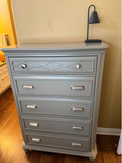 Five drawer lift top chest with mirror