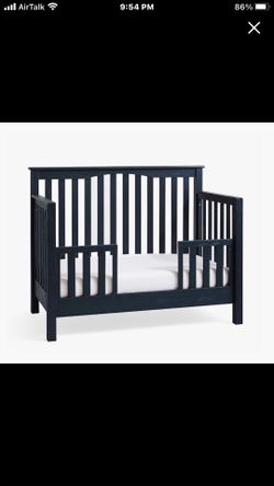 Crib converts into bed mattress not included