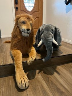 Giant Melissa & Doug stuffed Lion and Elephant