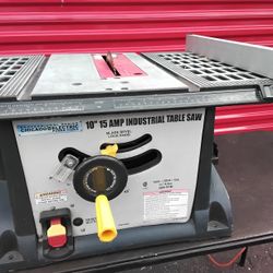 SAW WITH METAL 10 IN 15 AMP TABLE EXCELLENT CONDITIONS 