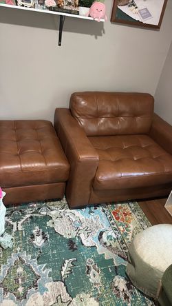 Beautiful leather chair with ottoman