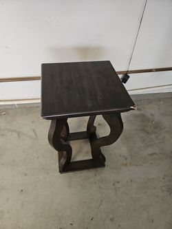 Dark Wood End Table with Curved Base