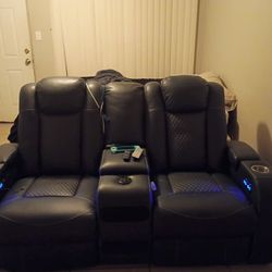 Ashley Furniture Leather Reclining Love Seat