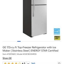 GE Stainless Steel Fridge With Black Sides