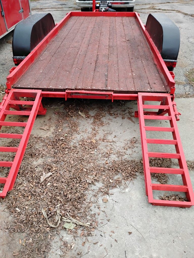 Trade this awesome construction trailer with a new winch