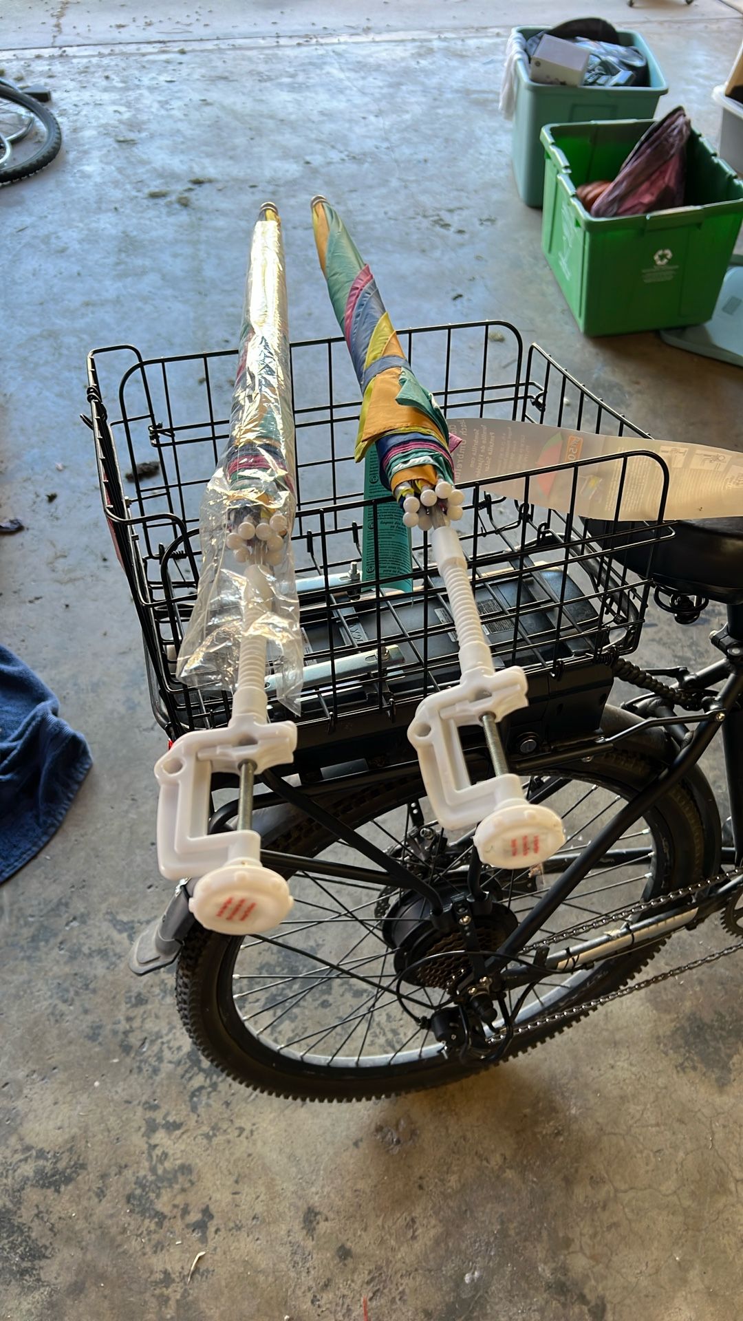 Two clamp on umbrellas