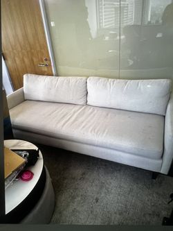A Beautiful Beige Color Sofa