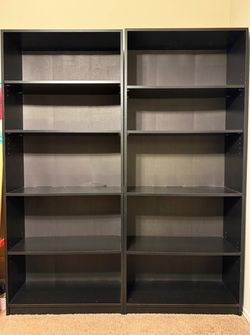 Two black IKEA Bookcases