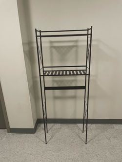 Behind toilet caddy