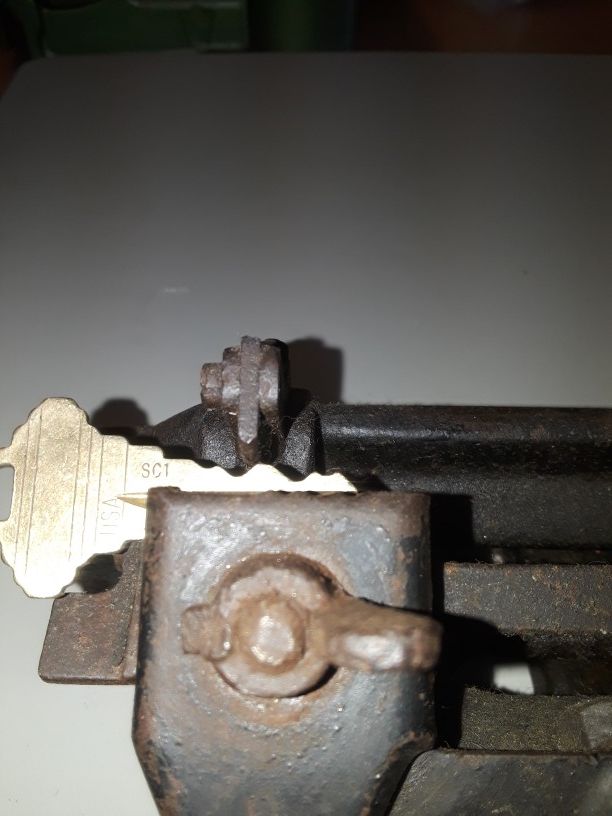 Antique key cutting machine by Yale