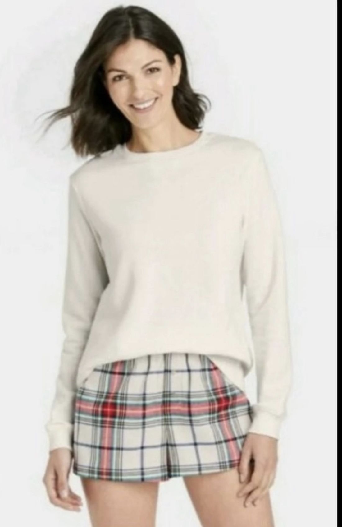Pajama set includes plush sweatshirt, flannel shorts small. (O)