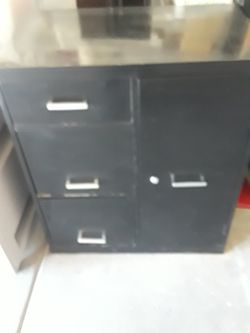 Filing cabinet with safe