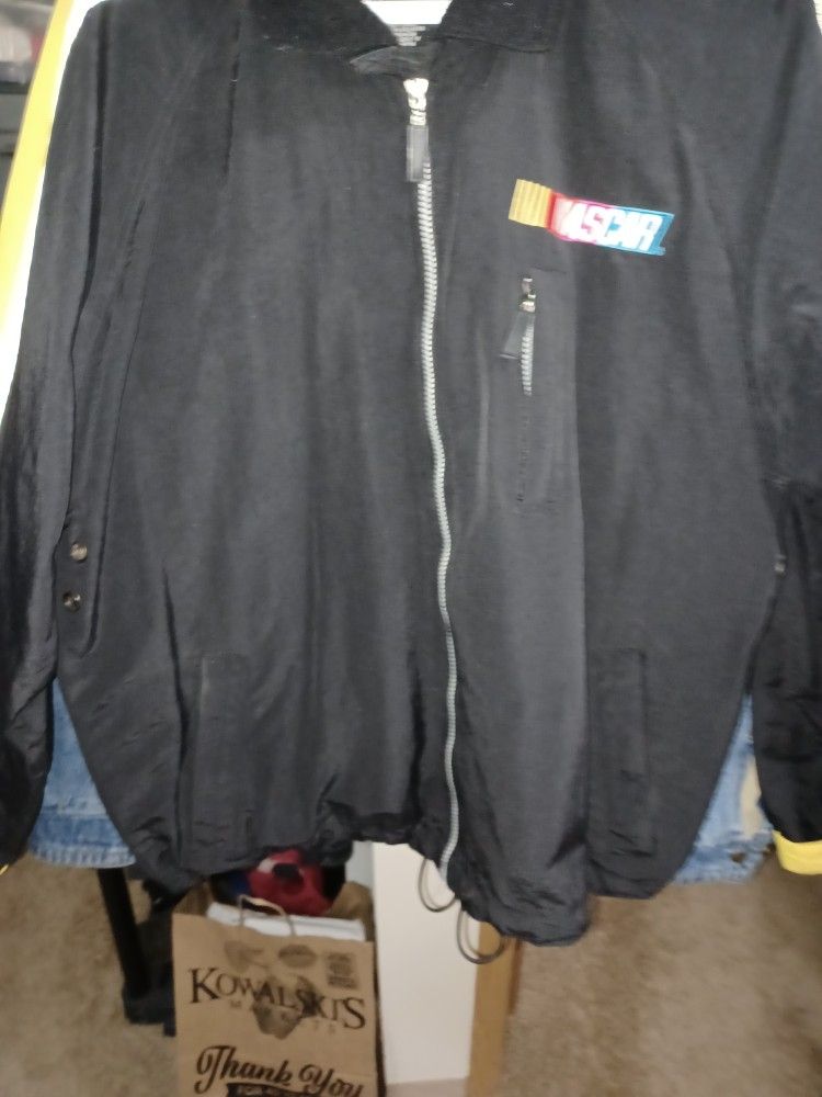 NIKON , LARGE WIND BREAKER COAT,WITH FELCRO SELVES
