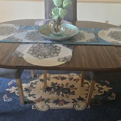Oval Drop-Leaf Wood Dining Table – $50