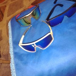 Four Pair Of Sunglasses