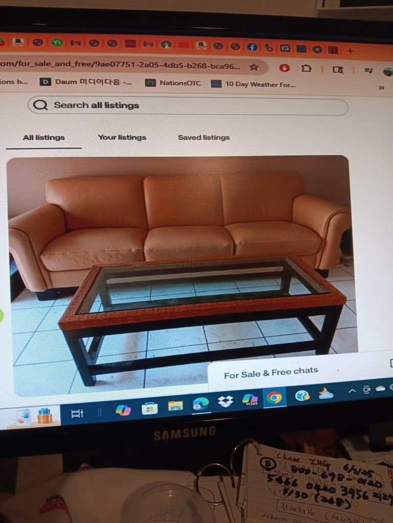 Beige Leather Sofa And Glass Coffee Table