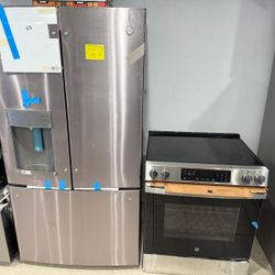 Kitchen GE Refrigerator French Door & Electric Slide Stove In Stainless Steel 