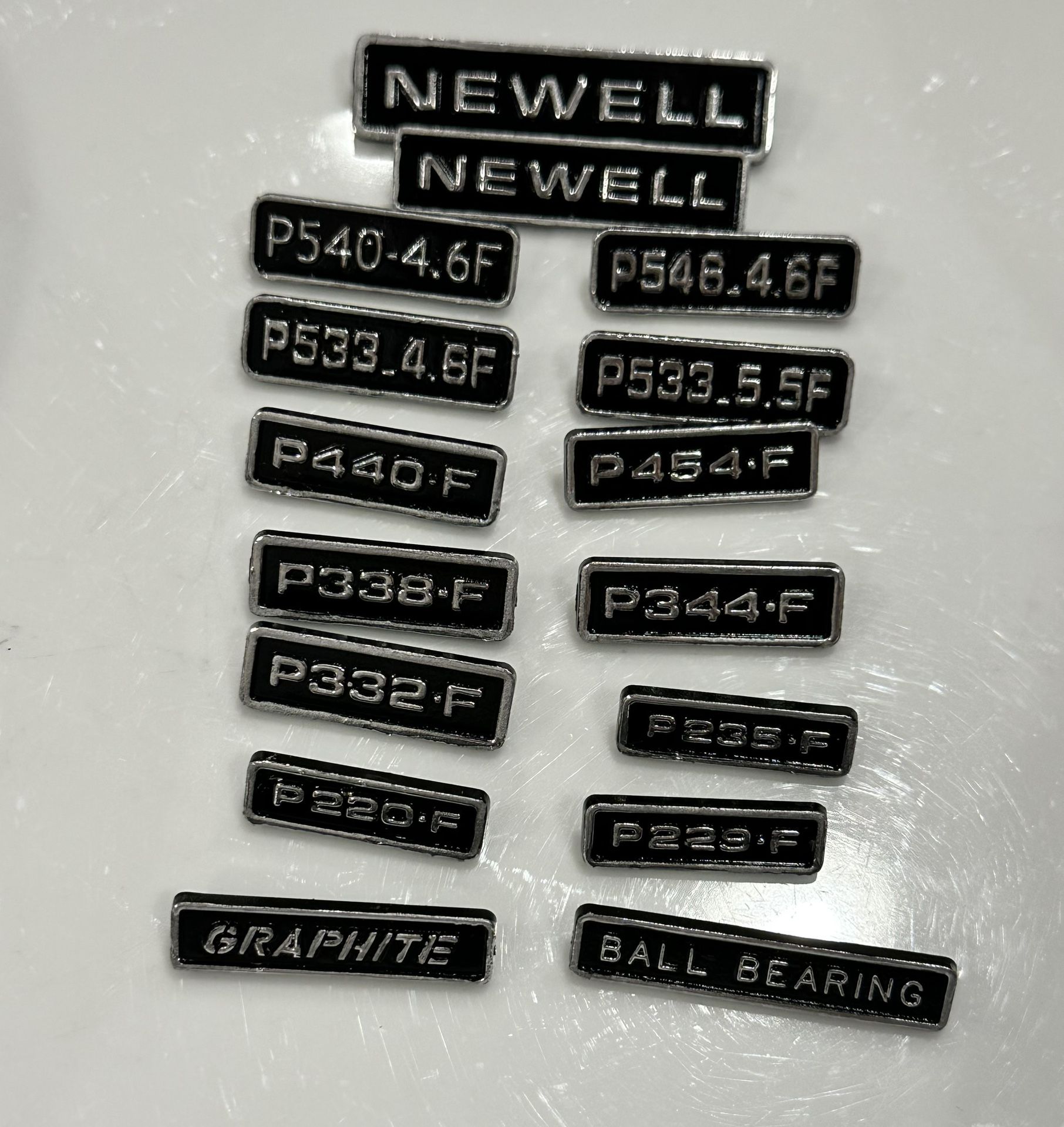 16 Assorted NEWELL P Series Badges 546 540 533 454 440 344