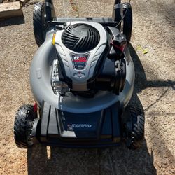 Murray 21 In. 140 cc Briggs and Stratton Walk Behind Gas Push Lawn Mower with Height Adjustment no bag used