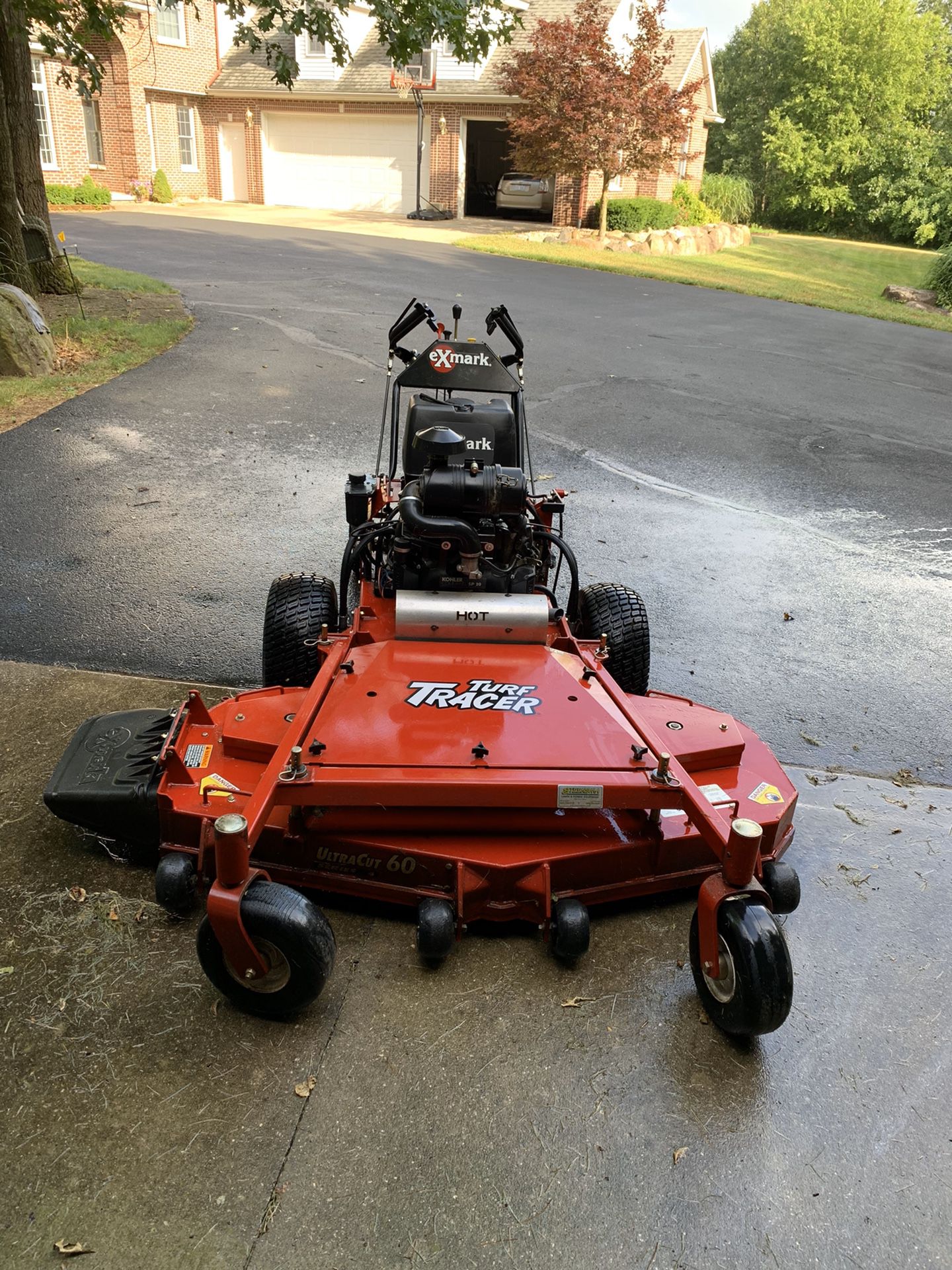 X Mark Turf Tracer. Never used commercially. 110 hours on the clock. Mulching blades, grass bag, and manual included.