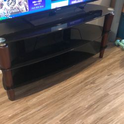 black glass tv stand. like new