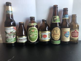Vintage lot of 7 beer bottles.