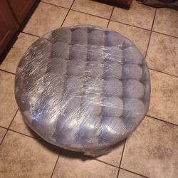 GREY TUFTED ROUND OTTOMAN 
