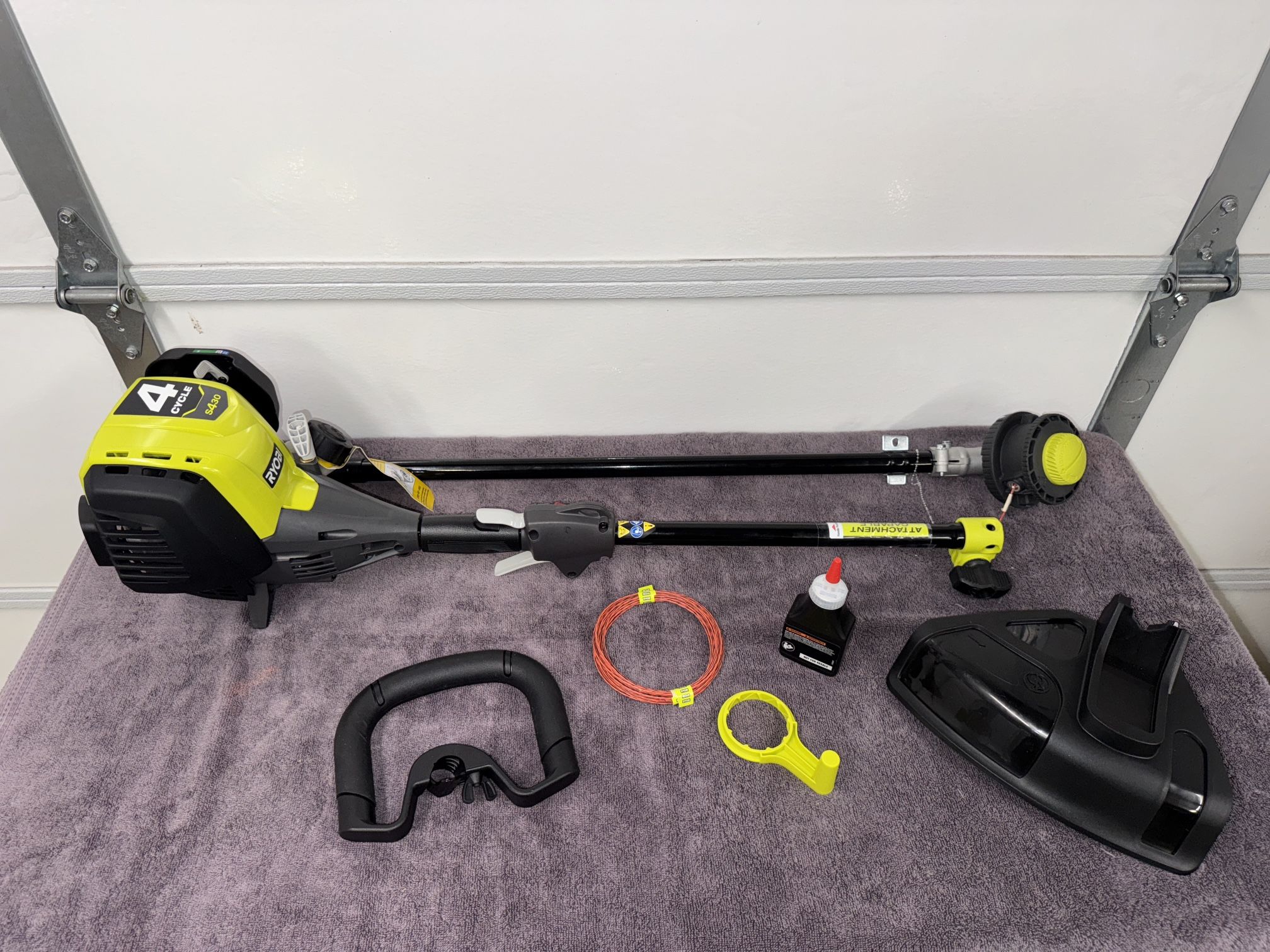RYOBI 4-Stroke 30 cc Attachment Capable Straight Shaft Gas Trimmer