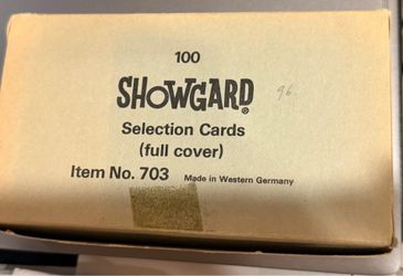 Showgard Selection Cards (Item No. 703) containing 100 full-cover philatelic stamp mounts, manufactured in Western Germany.