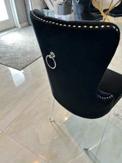 New set of four black chairs