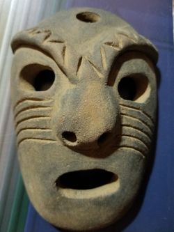 HAND MADE MASK , LIGHT CLAY-LIKE MATERIAL.