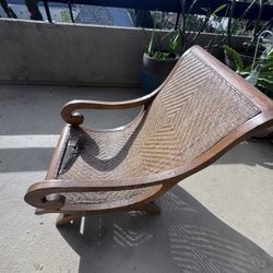 Handcrafted Wooden Lounge Chair with Woven Cane Seat