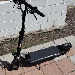 EMOVE Cruiser 52V 1600W Dual Suspension Electric Scooter