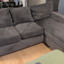 Free used L-shaped couch with built-in storage