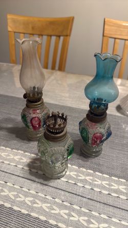 Set of three small oil lamps