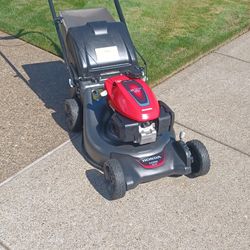 Like New Condition Honda HR And 216 Self-propelled Lawn Mower With Quadrablade Cutting System