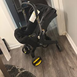 Doona Stroller/car seat Combo  with extra car base