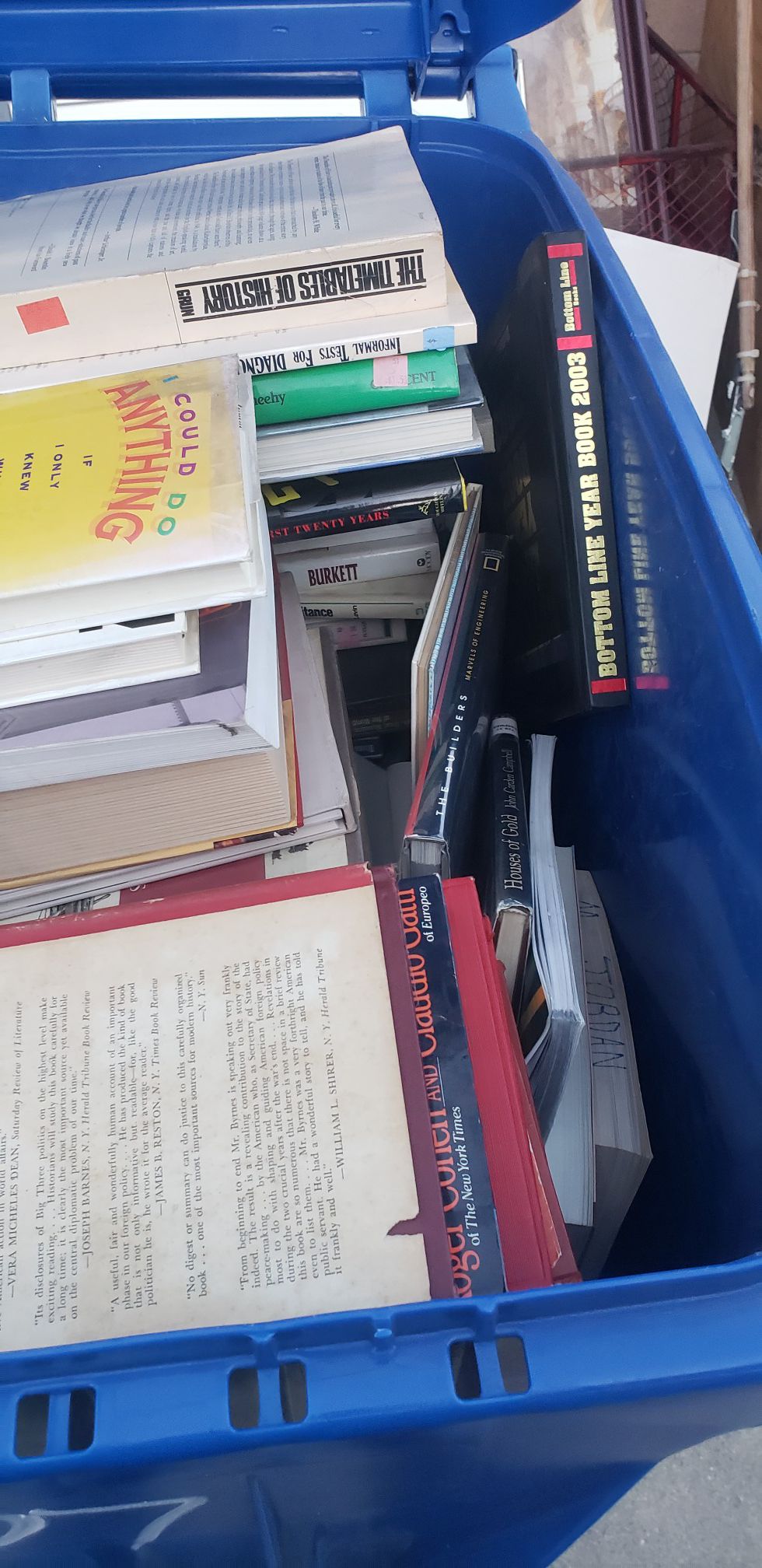 Recycle bin full of books