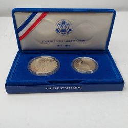 1986 PROOF STATUE OF LIBERTY 2 COIN SILVER DOLLAR AND CLAD HALF MINT SET 