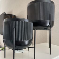 Two Glass Flower Pots With Holders